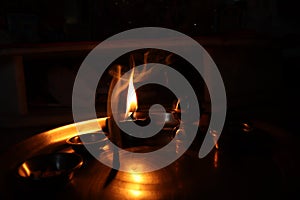 Flame light prayer devotional dark background