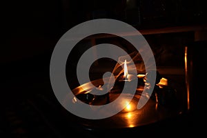 Flame light prayer devotional dark background