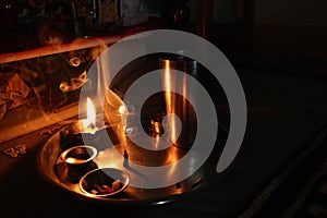 Flame light prayer devotional dark background