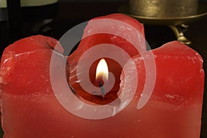 Flame of a red candle