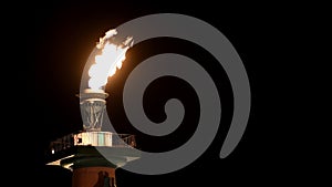 Flame on the Rostral column in St. Petersburg, Russia