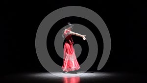 Flamenco Dance. Black background. Slow motion