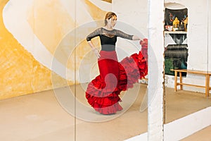 Flamenco dancer practicing on a studio