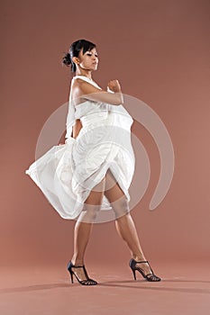 Flamenco dancer in white dress