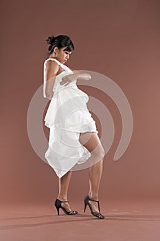 Flamenco dancer in white dress
