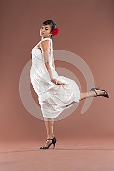 Flamenco dancer in white dress