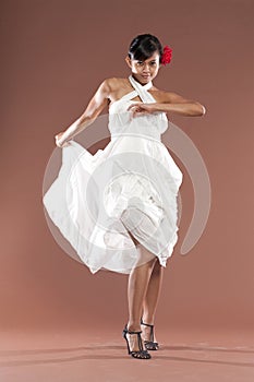 Flamenco dancer in white dress