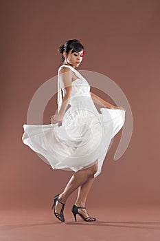 Flamenco dancer in white dress