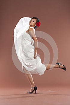 Flamenco dancer in white dress