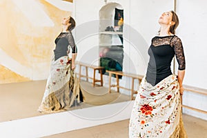 Flamenco female dancer looking up breathing