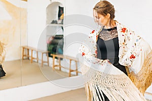 flamenco woman dancer in dance studio with copy space