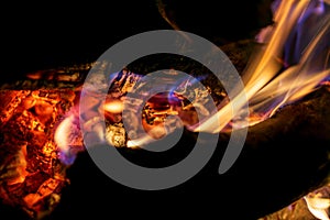 Flames of burning bonfire on black background