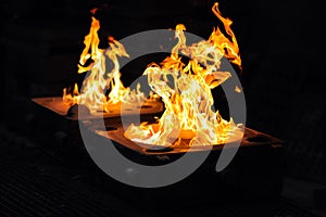 Flames after casting a workpiece in a foundry - production of s