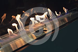 The flames in electric fireplace close-up