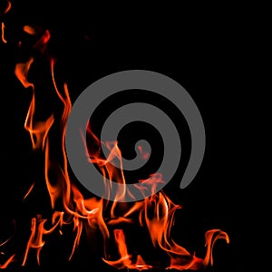 Flames of fire on a black background. Space for copy, text, your words. With a 1x1 square proportion. Diagonal