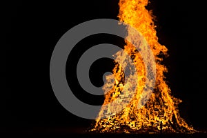 Flames and fire released by a pyre for the traditional epiphany festival in Italy