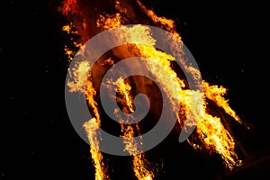 Flames and fire released by a pyre for the traditional epiphany night in Italy