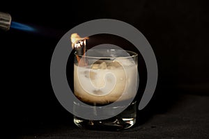 Flaming Cinnamon cocktail with kahlua, baileys irish cream and sambuca