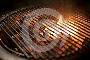 Flaming grill with hot charcoal, ready for food