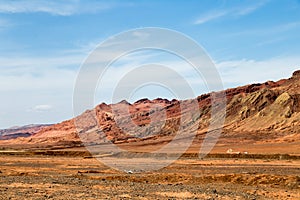 Flaming mountains, Turpan, Xinjiang, China: these intense red mountains appear in the Chinese epic â€œJourney to the westâ€.