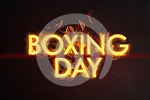 Flaming text Boxing Day on dark background