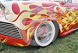 Flaming vintage car w/ naked lady rims