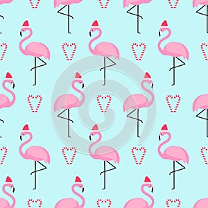 Flamingo in xmas hat with candy cane heart seamless pattern.