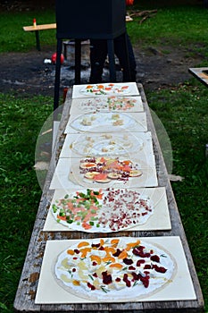 flammkuchen tarte flambe ready for oven french food