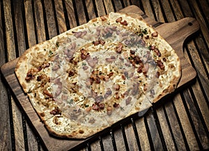 Flammkuchen tarte flambee rectangular pizza with bacon and chicken