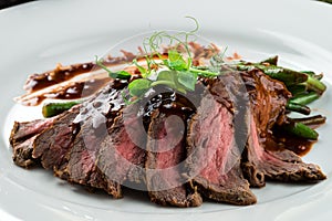 Flank steak with chimichurri sauce. healthy food, style vintage. Skirt steak photo