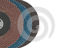 Flap discs for angle grinders in close-up over white