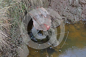 Flap on the outflow pipe