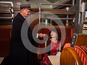 Flapper dress 1920 lady afternoon tea in train