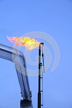 Flare stack with pipe on left