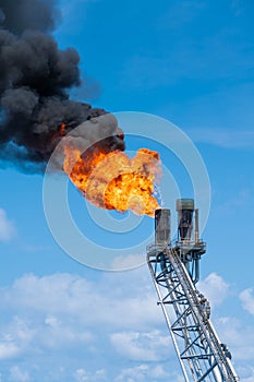 Flare tip of gas processing platform to vent and burn toxic, release gases to safe area photo