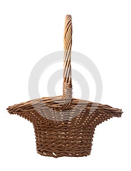 Flared, Little Bo Peep style wicker basket, for gathering flowers etc. Here empty, isolated on white background. With