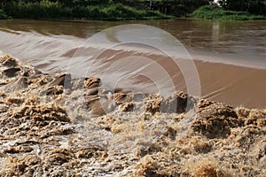 Flash floods flow into the Ping River