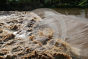 Flash floods flow into the Ping River