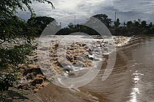 Flash floods flow into the Ping River