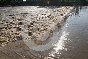 Flash floods flow into the Ping River