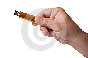 Flash memory hold by hand, isolated on a white background