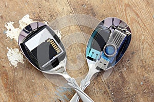 Flash memory, sd card, compact flash on spoon