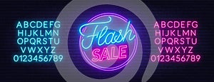 Flash sale neon sign on brick wall background.