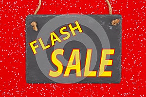 Flash Sale type message in a hanging blank chalkboard sign photo