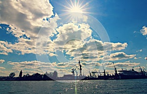 A flash shoots off the clouds in the port of Hamburg, Germany - GERMAN