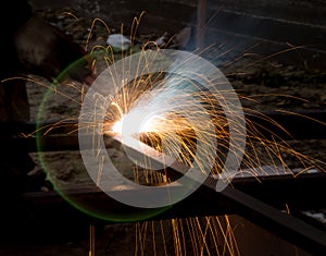 Flash and sparks from electric welding