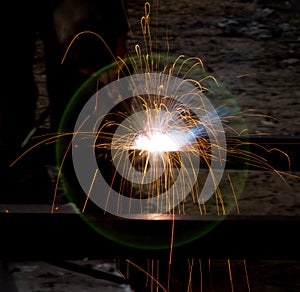 Flash and sparks from electric welding