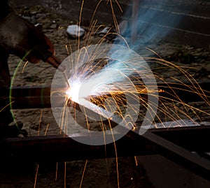 Flash and sparks from electric welding