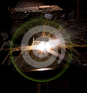 Flash and sparks from electric welding