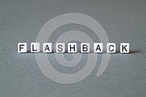 Flashback - word concept on cubes photo